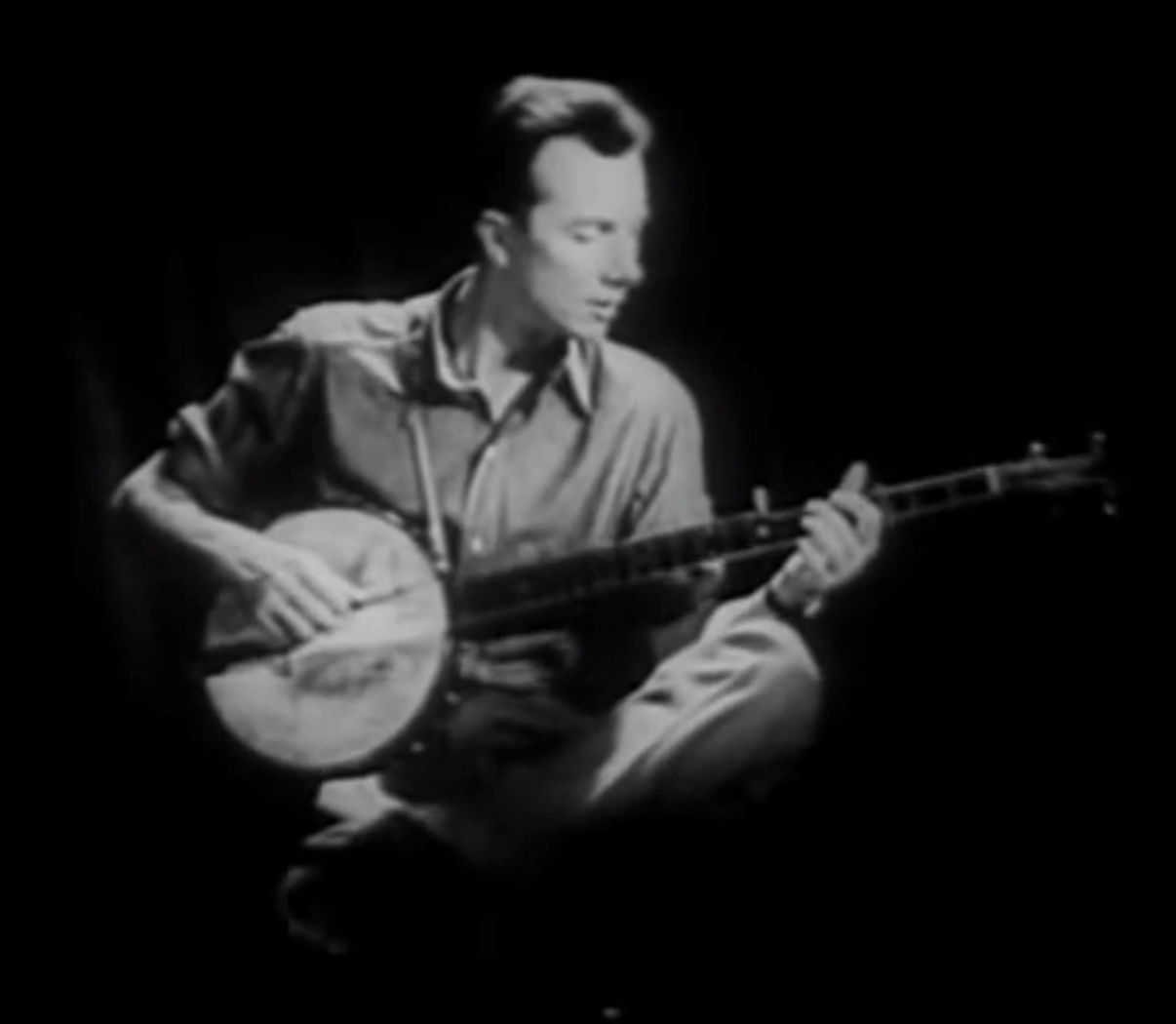 Man playing banjo.