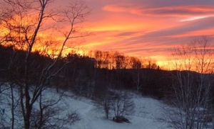 picture of snowy landscape at sunset
