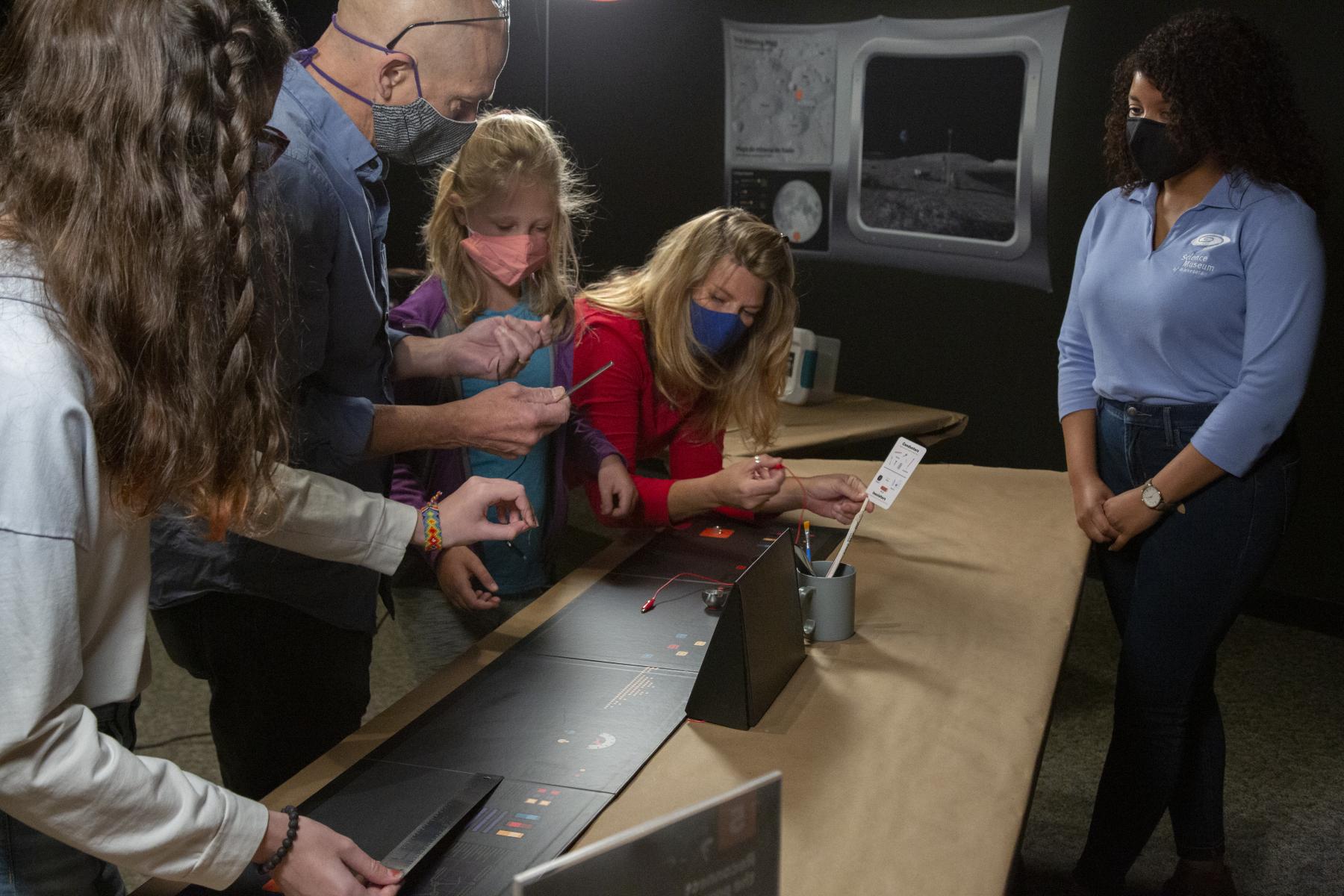 People playing the Moon adventure game