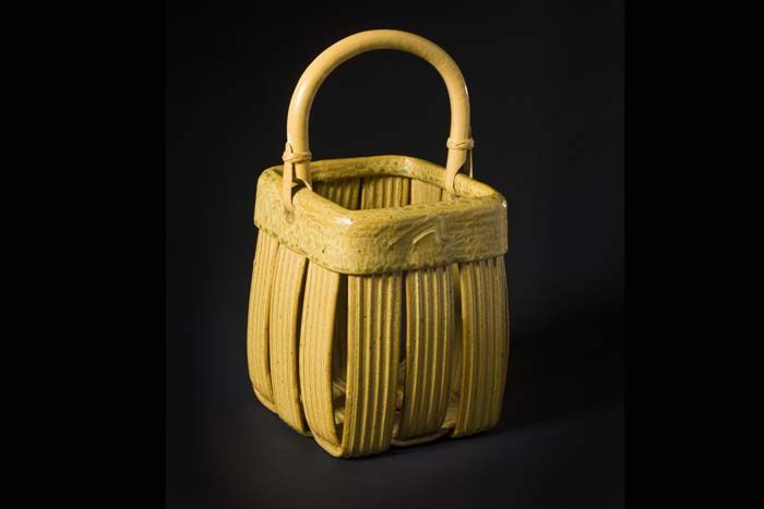 Jim and Shirl Parmentier, Woven Clay Basket with Bamboo Handle. Gift of Bernard J. and Patricia H. Hyman.